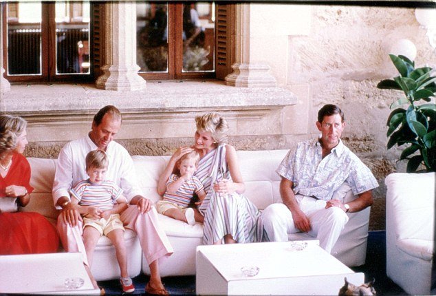 In one picture, King Juan Carlos of Spain sits with the small Prince William, while a radiant Princess Diana, a protective arm round toddler Prince Harry, leans in to share a pleasantry with the good-looking monarch