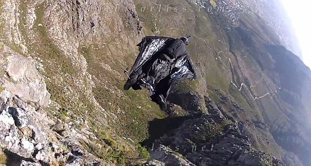 Jeb Corliss almost died after crashing into a cliff during a botched leap from Table Mountain in South Africa