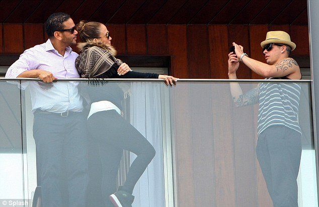 Jennifer Lopez and her manager, Benny Medina, in Rio de Janeiro posing for pictures that Casper Smart took