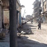 More than 200 people were killed by Syrian government forces which bombarded the city of Homs with tank shells and mortars, opposition groups say