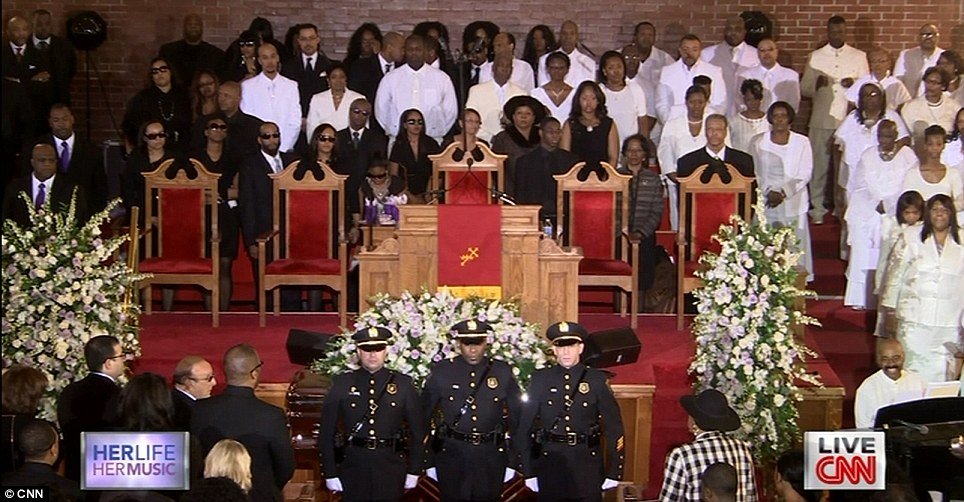 Mourners, officers and the choir gathered inside the New Hope Baptist Church at Whitney Houston’s home-going service