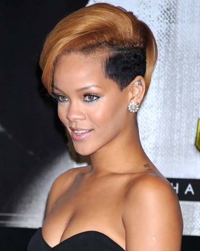 Rihanna is shortlisted to star as Whitney Houston in a movie biopic of the late singer