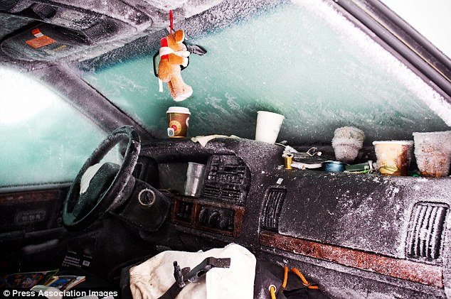 The images from inside Peter Skyllberg’s car show the dashboard and seats covered in ice after temperatures plunged to -30C