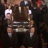 Whitney Houston’s casket was carried out of the church while her unforgettable voice could be heard singing her greatest hit I Will Always Love You