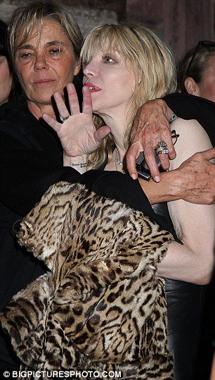 Courtney Love was spotted stumbling around the streets of Manhattan last night after leaving a fashion party in New York with the aid of an assistant