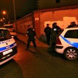 French police hunting an Algerian-origin gunman suspected of killing seven people in southern France in two separate attacks, including Ozar Hatorah Jewish school, have surrounded his flat in Toulouse