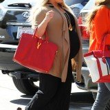 Heavily pregnant Jessica Simpson is refusing to put her feet up less than a few weeks away from her due date