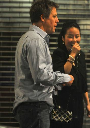 Hugh Grant has claimed that his daughter's mother Chinese actress Tinglan Hong has been "badly treated" by the media