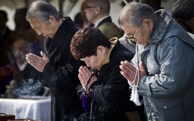 Japan marks one year commemoration of the devastating earthquake and tsunami, which struck the north-eastern coast, leaving 20,000 dead or missing