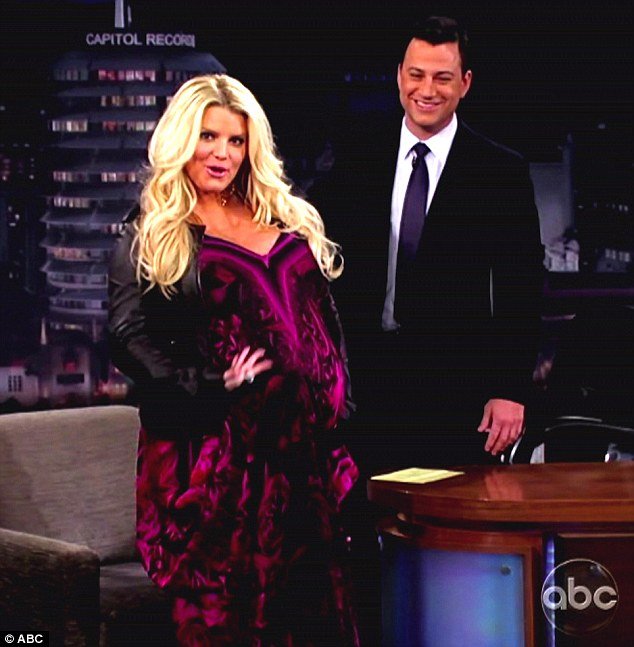 Jessica Simpson has put her extremely blooming figure down to the fact that she has a lot of amniotic fluid