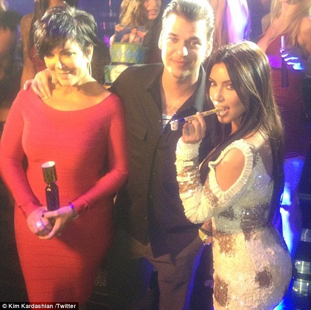 Kris Jenner, her son Rob Kardashian and daughter Kim in the 1 Oak Club at the Mirage Hotel in Las Vegas celebrating his 25th birthday