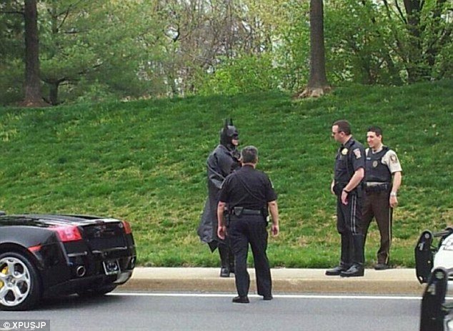 Lenny B. Robinson the man dressed as Batman was heading to a local children’s hospital photo