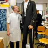 Sultan Kosen, the world's tallest man, may have finally stopped growing at a towering 8ft 3ins (251.4 cm) thanks to a pioneering new treatment Sultan Kosen, the world's tallest man, may have finally stopped growing at a towering 8ft 3ins (251.4 cm) thanks to a pioneering new treatment