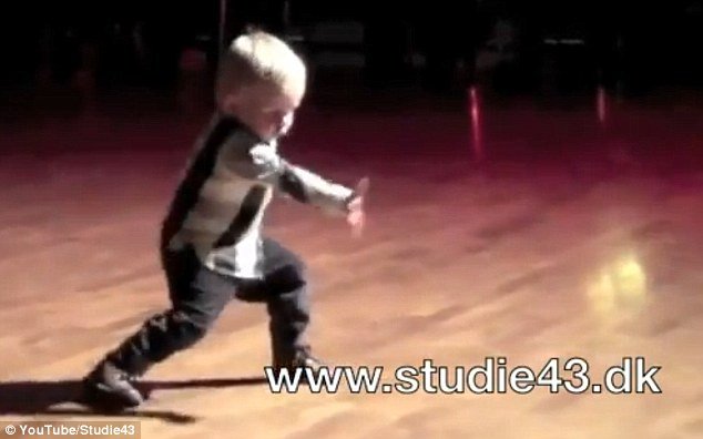 William Stokkebroe, 2, wins over the crowd by gyrating his hips, clapping, tapping his feet and attempting to sing along to Jailhouse Rock