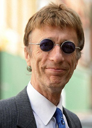 Bee Gee star Robin Gibb is lying in a coma and doctors fear he only has days to live