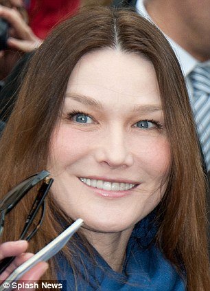 Carla Bruni looked almost unrecognizable yesterday as she voted in the French presidential elections 