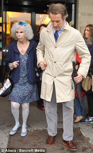 Duchess of Alba held hands with Alfonso Diez as they strolled the streets of the French capital