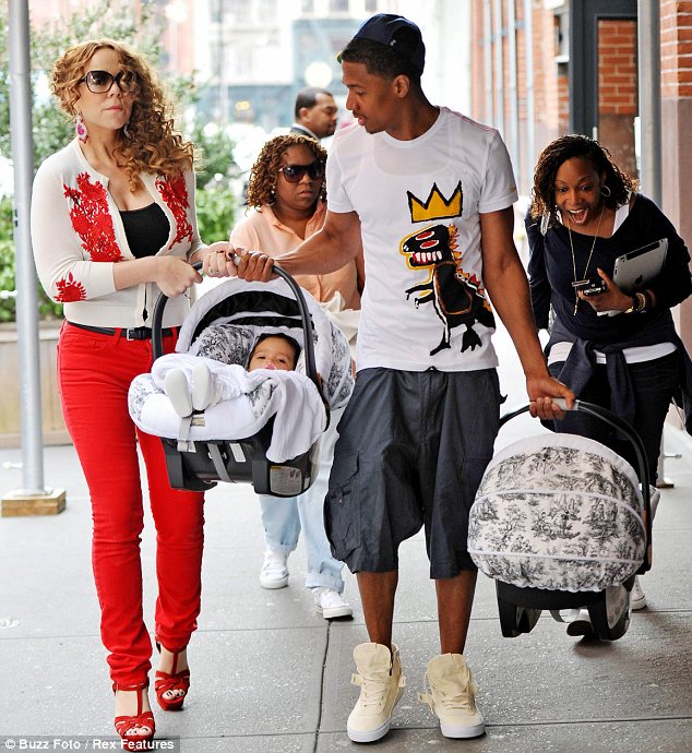 Nick Cannon was seen dressed in an outfit much younger than his years as he stepped out with Mariah Carey and their children