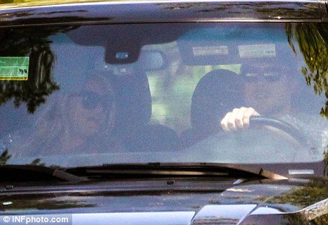 An overdue Jessica Simpson was yesterday spotted out for a drive with fiancé Eric Johnson