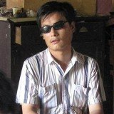 Chen Guangcheng has phoned a US Congressional hearing to plead for help in his attempts to leave China with his family