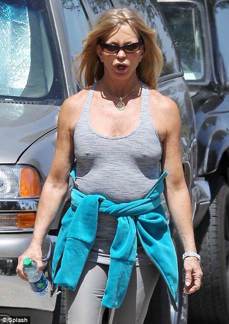 Goldie Hawn opted to go without any support as she went for a jog in Brentwood yesterday