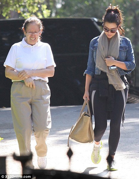 Kim Kardashian spent hours with lawyer Laura Wasser after Kris Humphries pressed for a divorce trial