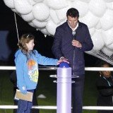 Niamh Clarke-Willis joined LOCOG head Lord Sebastian Coe to hit a button which launched balloons into the sky above London Olympic Stadium for this summer's Games