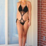 Pregnant Tori Spelling was spotted yesterday wearing a very daring monokini as she enjoyed a family BBQ in Los Angeles