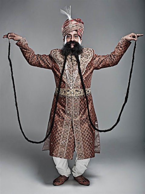 Ram Singh Chauhan from India has the world's longest moustache, which is officially recorded by Guinness World Records as 4.29 m (14 ft) long