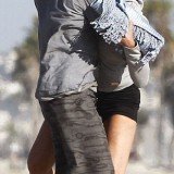 Sharon Stone was spotted getting more than a little frisky on the beach with her Argentinian boyfriend Martin Mica in Los Angeles