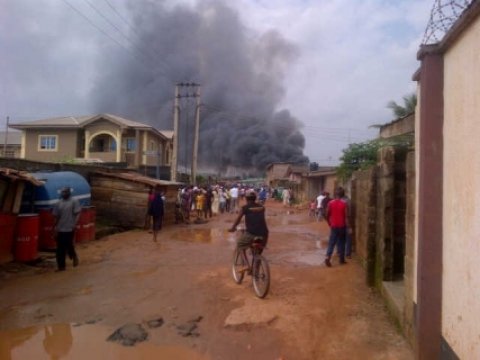 A Dana Air passenger plane with at least 162 people on board has crashed into a building in Nigeria's main city of Lagos