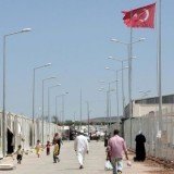 A general, two colonels, two majors and about 30 other soldiers are said to have crossed into Hatay province on Sunday night
