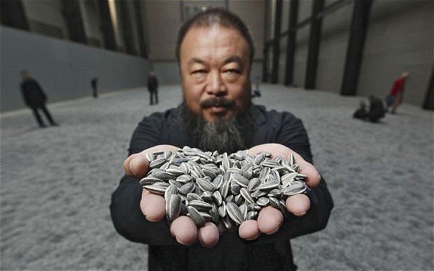Ai Weiwei said that a number of police cars arrived at his studio and an employee filming the vehicles was roughed up