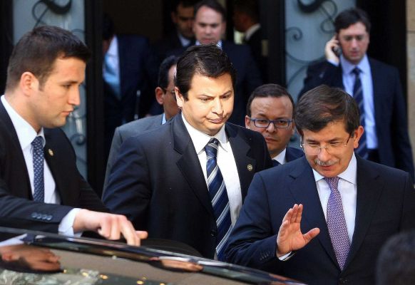 Foreign Minister Ahmet Davutoglu became the first senior Turkish official to challenge Syria's account of the downing of the jet