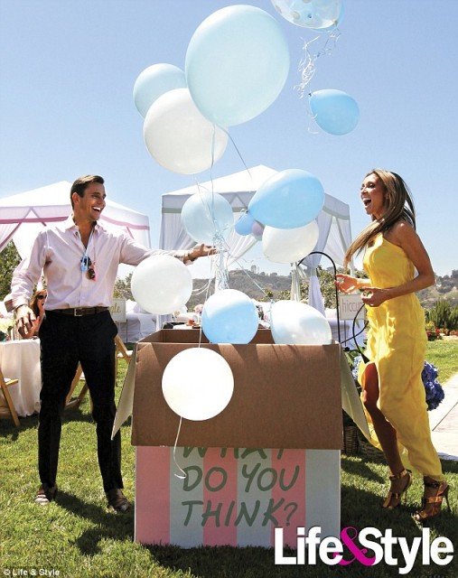 Giuliana and Bill Rancic used a creative way to let their friends know they were expecting a son at their guessing-themed Beverly Hills bash over the weekend