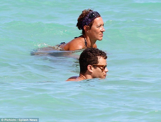 Kris Humphries was photographed in the turquoise blue Florida waters with the woman, who TMZ has identified as Tracy Paradise