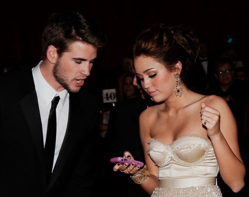 Miley Cyrus announces that she is engaged to The Hunger Games actor Liam Hemsworth