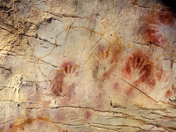 Researchers have found that red dots, hand stencils and animal figures represent the oldest examples yet found of cave art in Europe
