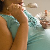 The myth says that women can pile on the pounds when expecting a baby, but the evidence tells a different story