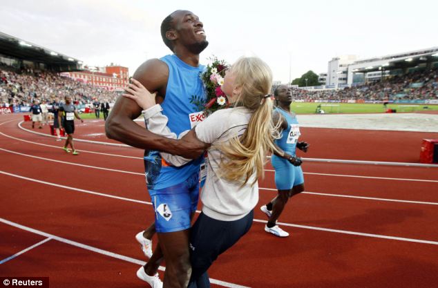 Usain Bolt crashed into a flower girl at the end of his 100 m sprint last night in Oslo where he ran the second fastest time this year