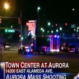 A gunman wearing a gas mask opened fire at the cinema complex in Aurora, at a midnight showing of The Dark Knight Rises