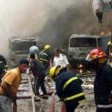 At least 19 people have been killed in two car bomb explosions in the Iraqi capital, Baghdad