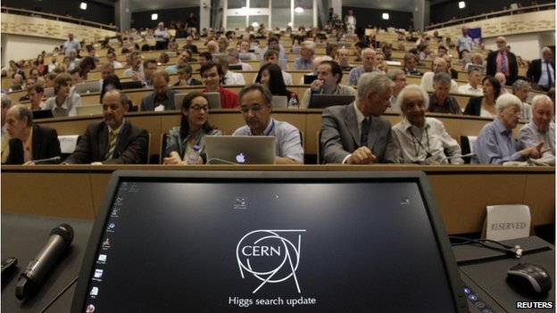 CERN scientists reporting at conferences in the UK and Geneva claim the discovery of a new particle consistent with the Higgs boson