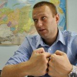 Russian anti-corruption campaigner Alexei Navalny has been charged with embezzlement in a case he describes as "strange and absurd"
