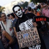 Tens of thousands of people held largely peaceful protests across Spain against the latest government austerity measures