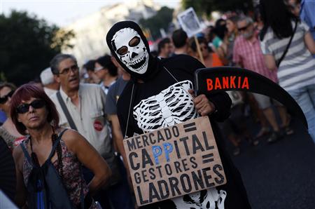 Tens of thousands of people held largely peaceful protests across Spain against the latest government austerity measures