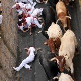 This year's Pamplona bull running festival kicked off today with one thrill-seeker was gored in a leg and four others injured