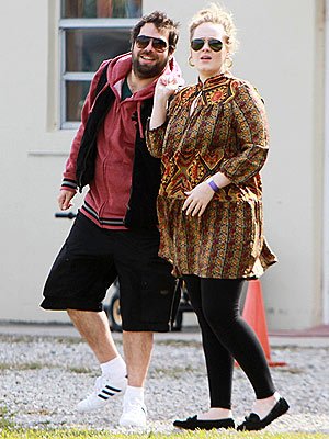 Adele Adkins has taken to her Twitter account to deny that she has married her fiancé Simon Konecki
