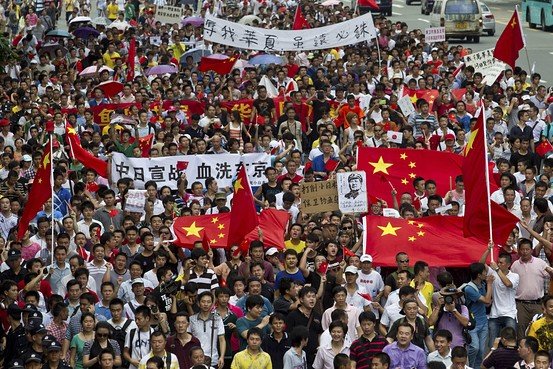 Anti-Japanese protests took place in cities across China after Japan's nationalists raised their country's flag on disputed islands