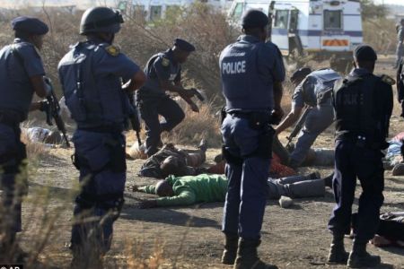 At least 30 people have been killed after South African police clashed with striking miners at Lonmin Marikana mine on Thursday